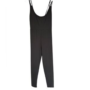Pretty Little Thing black romper/jumper.
Spaghetti straps size 12
